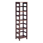 A tall bookshelf with four shelves, filled with various books and decorative items.